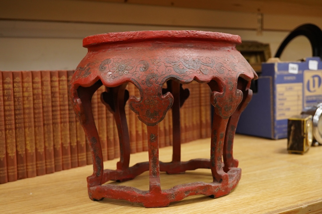 A Chinese red lacquer stand, 24.5cm high